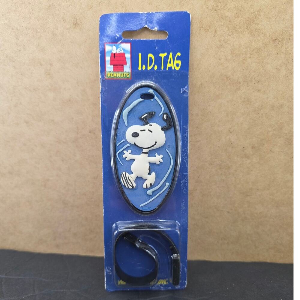 vintage Peanuts Snoopy rubber ID tag wild trend